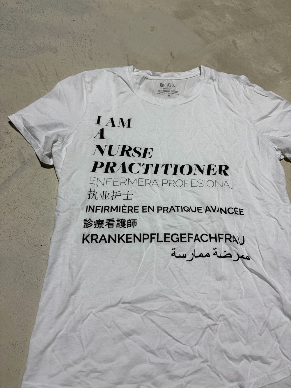 Figs I Am A Nurse Practitioner Graphic Tee White medium